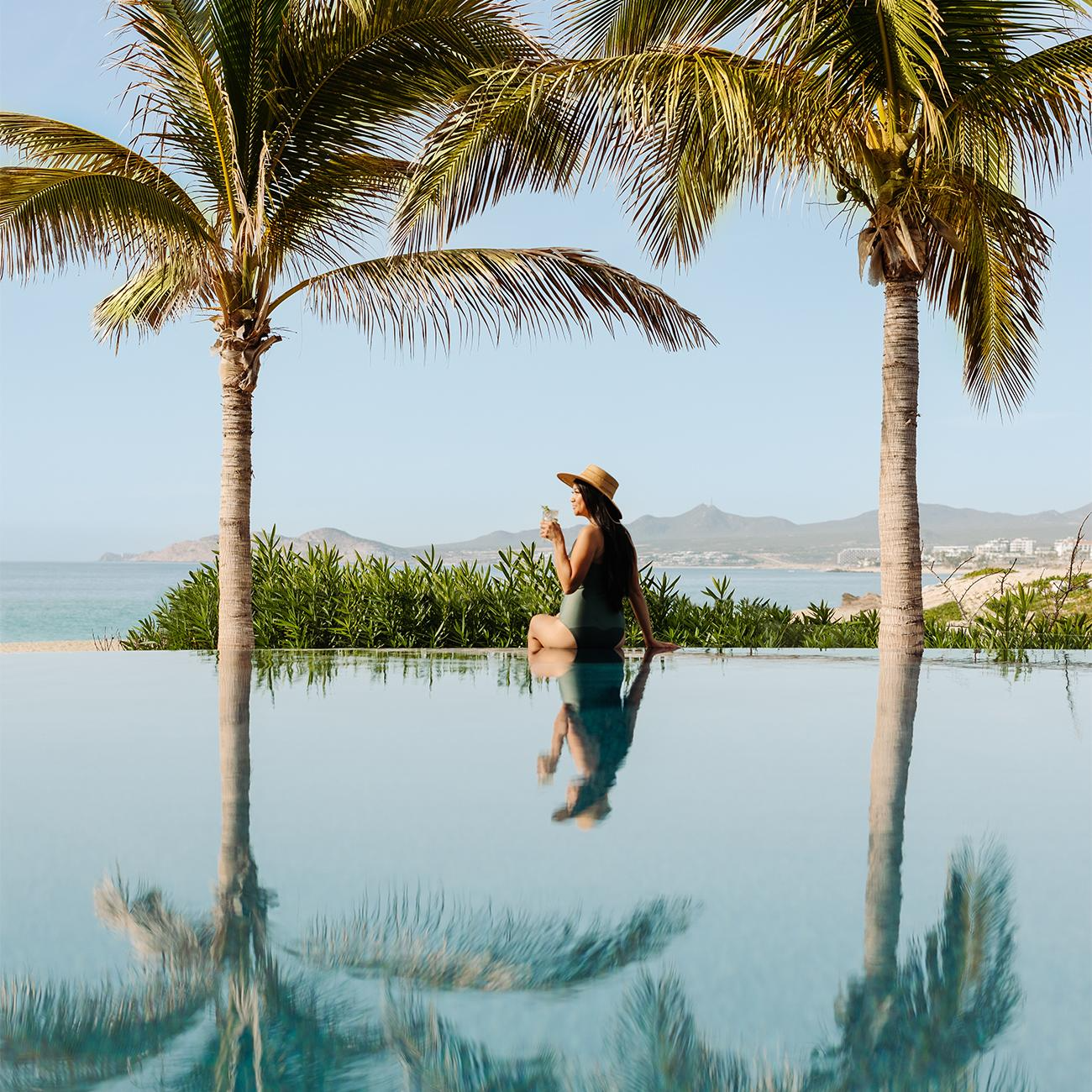 Woman lounging at the pool