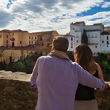 Couple overlooking Spanish town