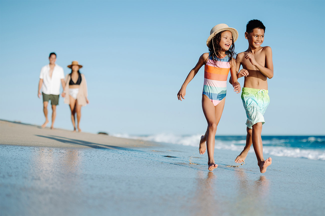 Family walking on a beach